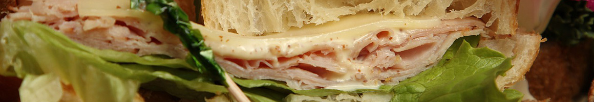 Eating Deli Sandwich at Breadsoda Bar, Deli & Billiards restaurant in Washington, DC.